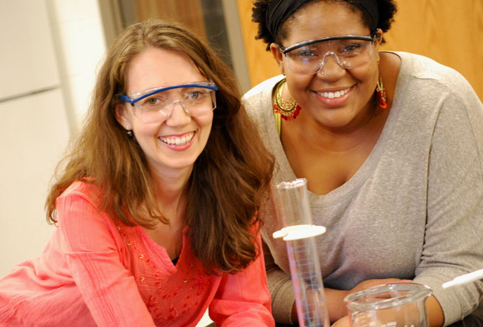 ATMOSPHERE OF LEARNING: Dr. Elizabeth Malcolm (left) in the newly renovated Blocker Environmental Science Lab with student Erica Sears '13. (Photo by Janice Marshall-Pittman) alt
